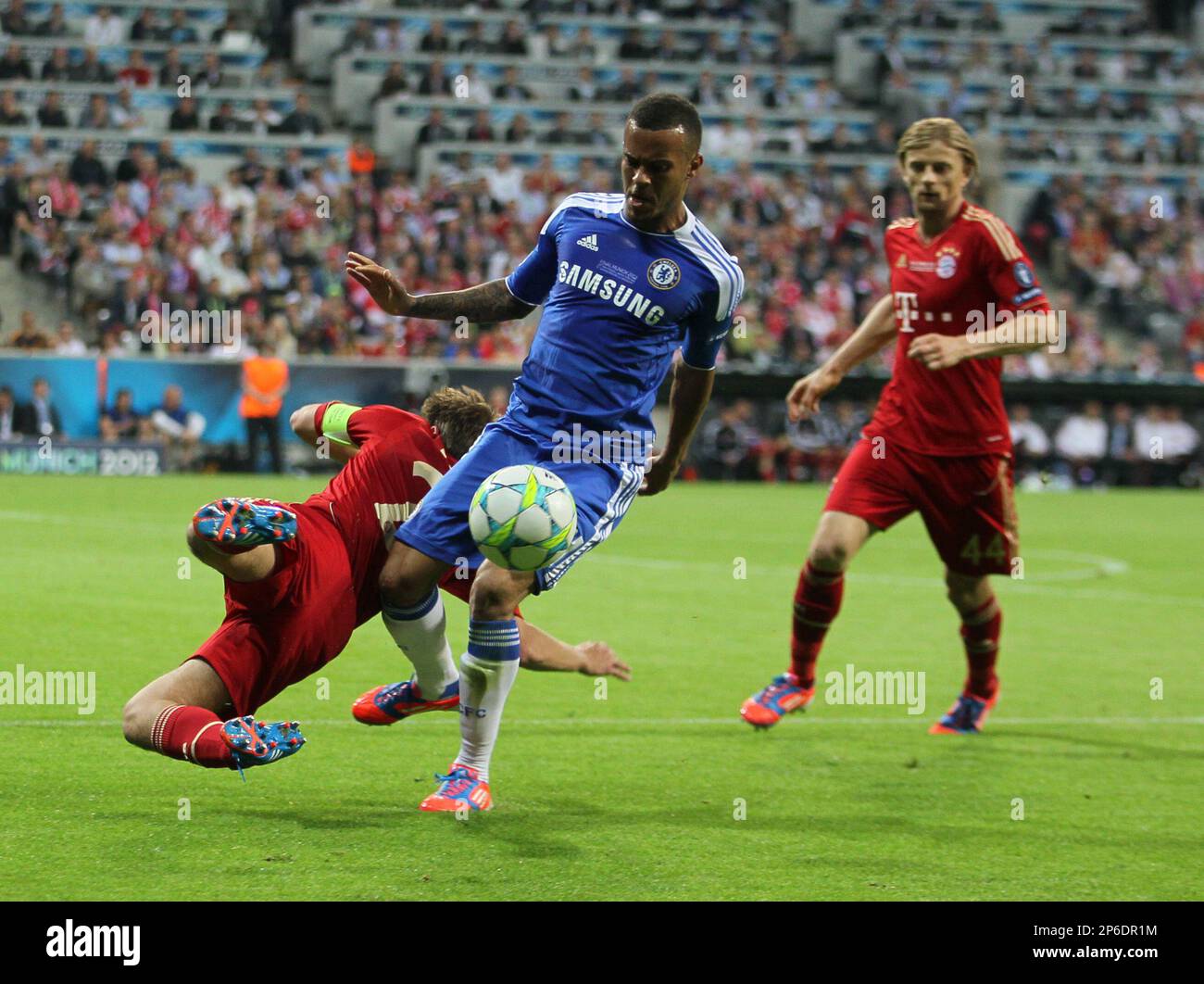 Philipp Lahm of Bayern Munich is bested by Ryan Bertrand of Chelsea.in ...