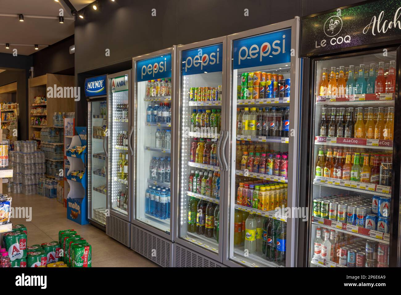 Interior view of store with soft drinks and beer in cooling chambers