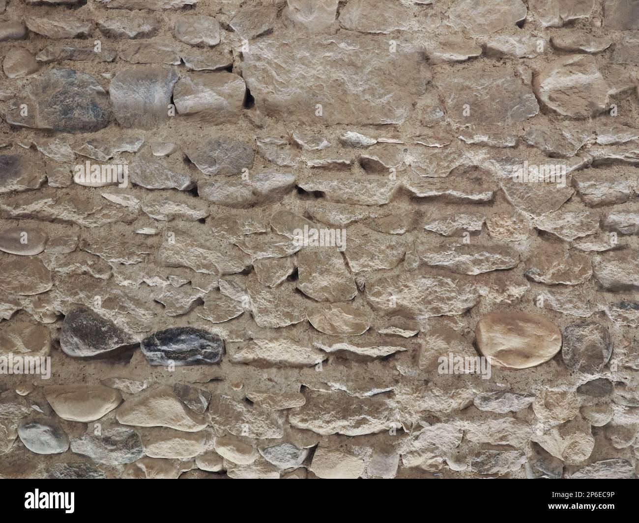 grey stone wall useful as a background Stock Photo - Alamy