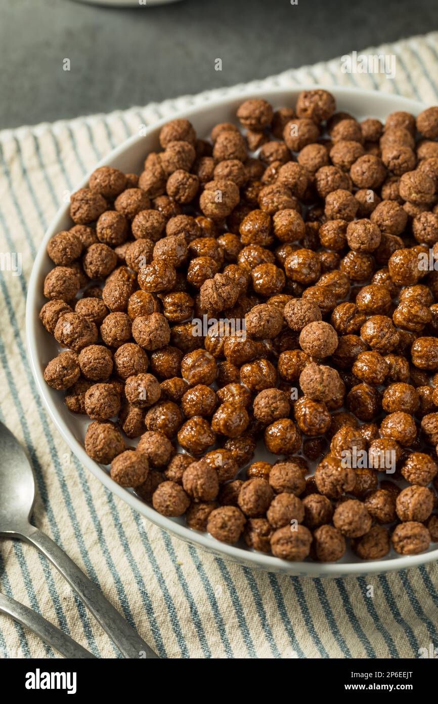 Healthy Sweet Chocolate Puff Cereal with Milk Stock Photo Alamy
