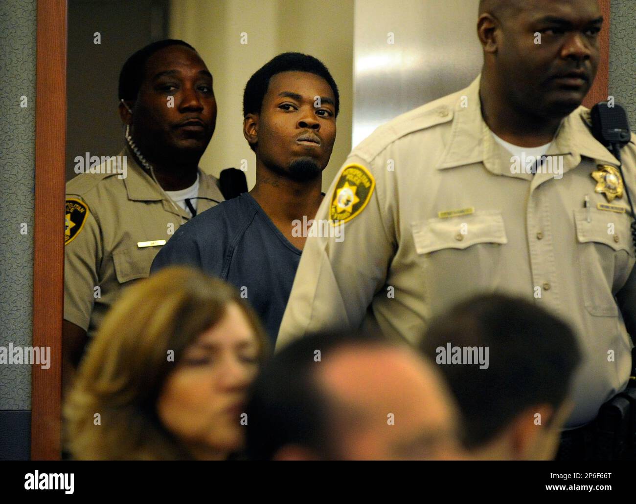 Bryan Devonte Clay Jr. enters the courtroom of Justice of the Peace Melissa  Saragosa at the Regional Justice Center in Las Vegas on Tuesday, May 1,  2012. Clay is accused of a