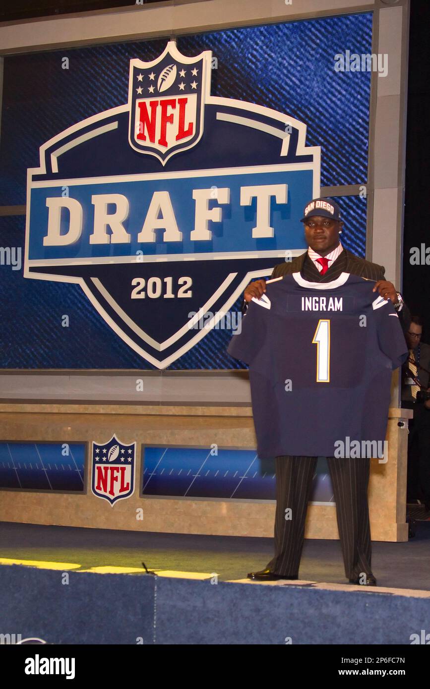 April 26, 2012: Melvin Ingram, defensive end from South Carolina and  drafted with the 18th pick by San Diego Chargers, holding up his new jersey  during the 77th National Football League Draft