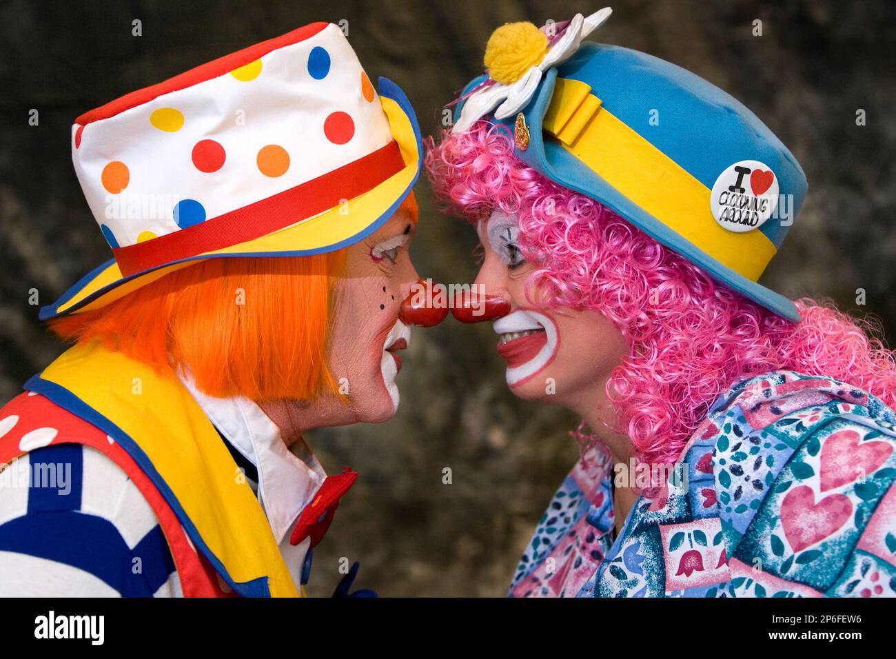 Jay J. the clown as known as James Caffrey, left, and LaDitzy the clown, also known as Debbie Fowler of Walcott, N.D. clown around at the Clowns of America International clown convention, Wednesday, April 25, 2012, in Kansas City. Mo. (AP Photo/The Kansas City Star, Tammy Ljungblad) Stock Photo