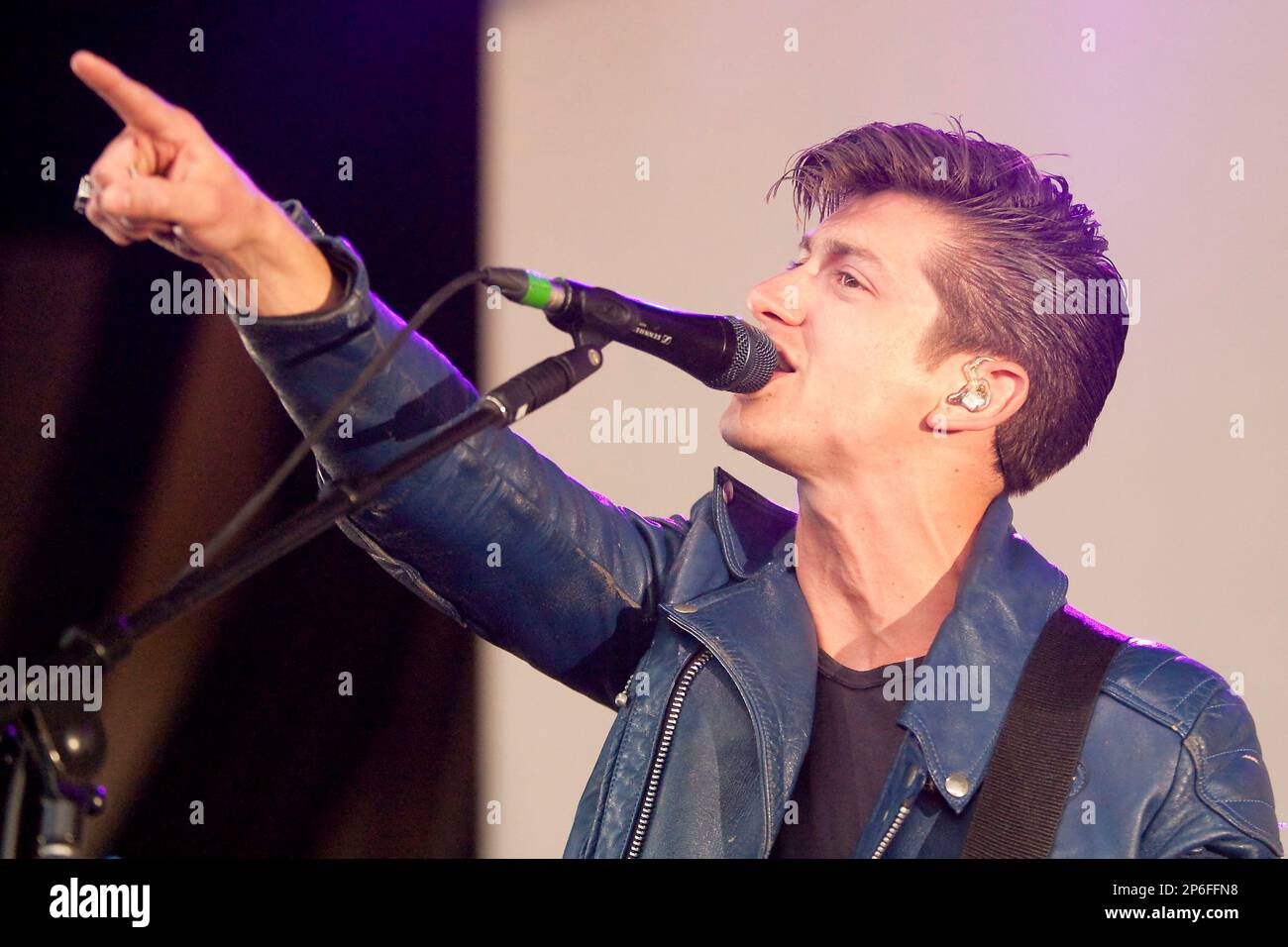 In this April 24, 2012, photo, Alex Turner of Arctic Monkeys performs at the Cynthia Woods Mitchell Pavilion in The Woodlands, Texas. (AP Photo/The Courier, Karl Anderson) Stock Photo