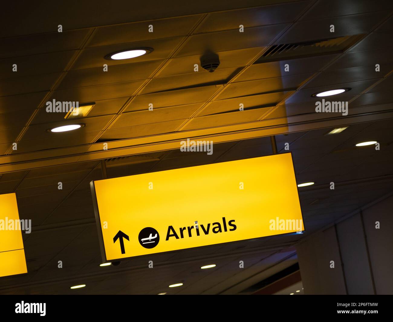 Heathrow Airport Arrivals Sign in Terminal 3 Stock Photo