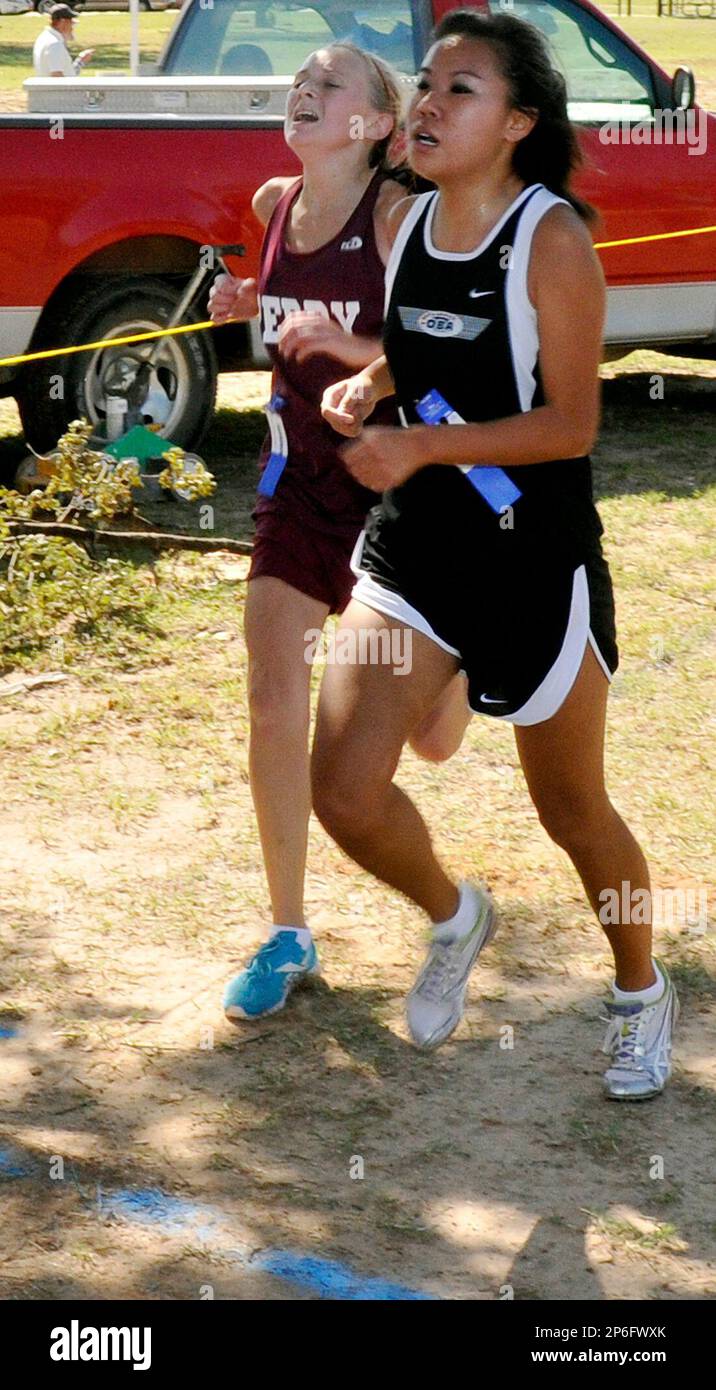 OBA's Deborah Park finishes ahead of a runner from Perry during the