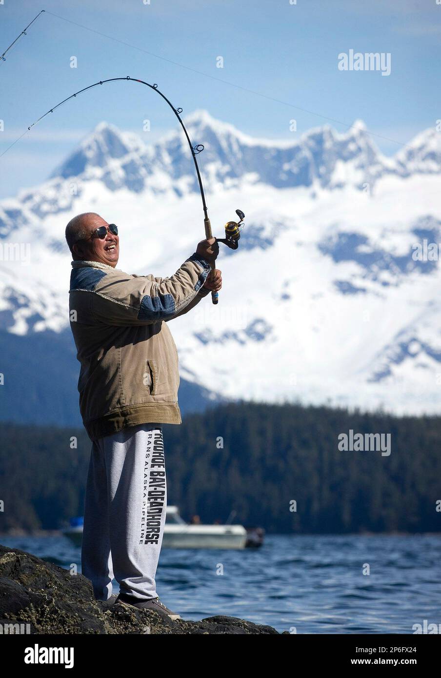 Romy Mueca casts off of the rocks at False Outer Point in Juneau