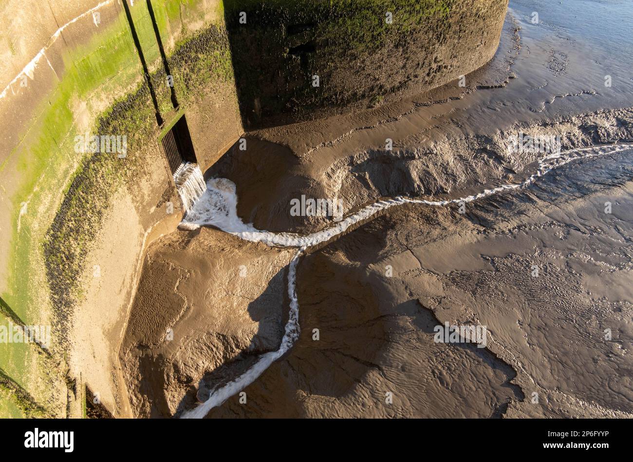Waterfront Pier Head waters being runoff into the River Mersey in Liverpool Stock Photo