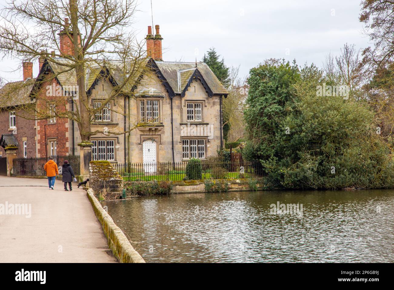 People walking in the grounds of Melbourne Hall country house in