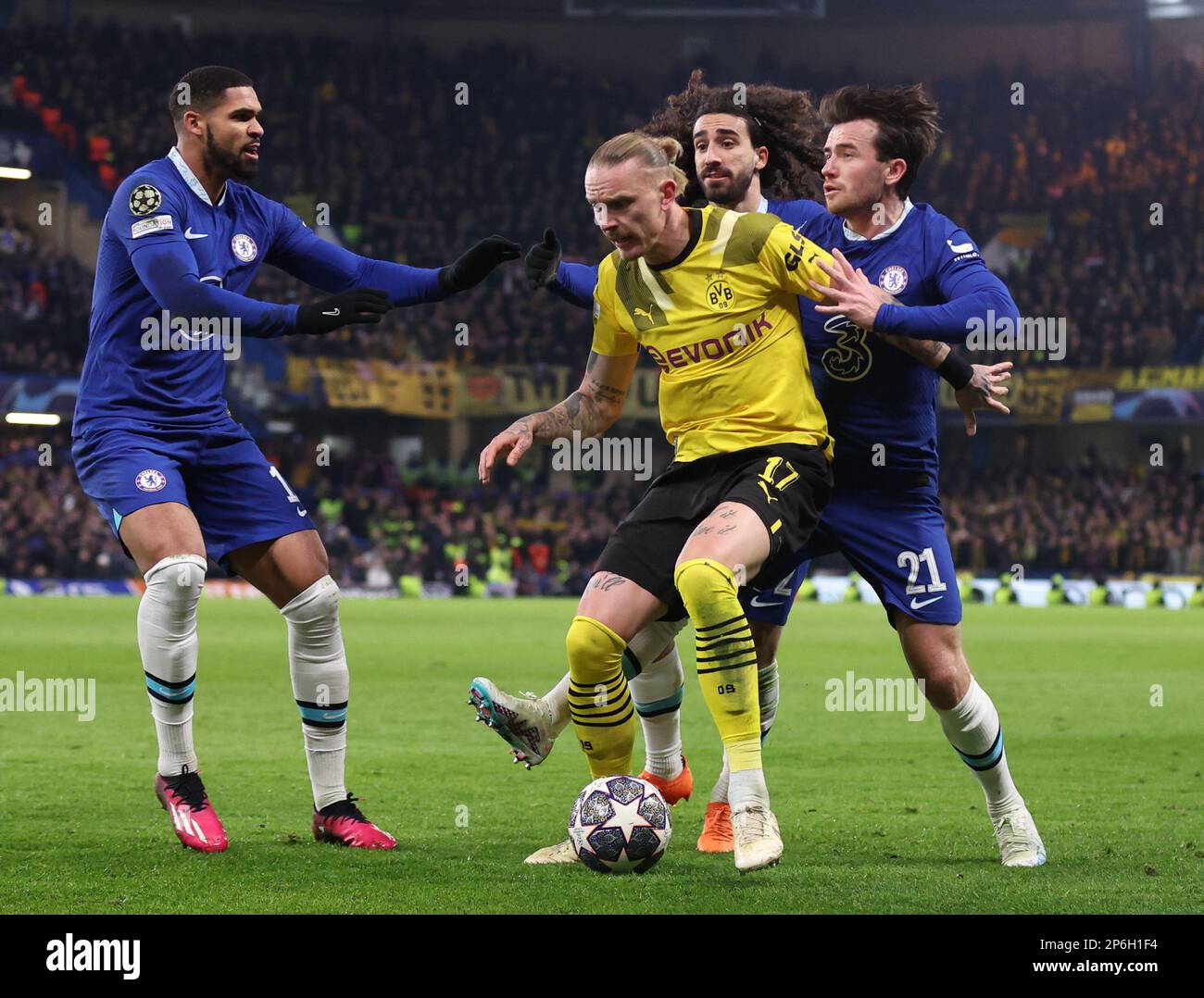 London, England, 7th March 2023. Ben Chilwell of Chelsea tackles Marius Wolf of Borussia Dortmund  during the UEFA Champions League match at Stamford Bridge, London. Picture credit should read: David Klein / Sportimage Stock Photo