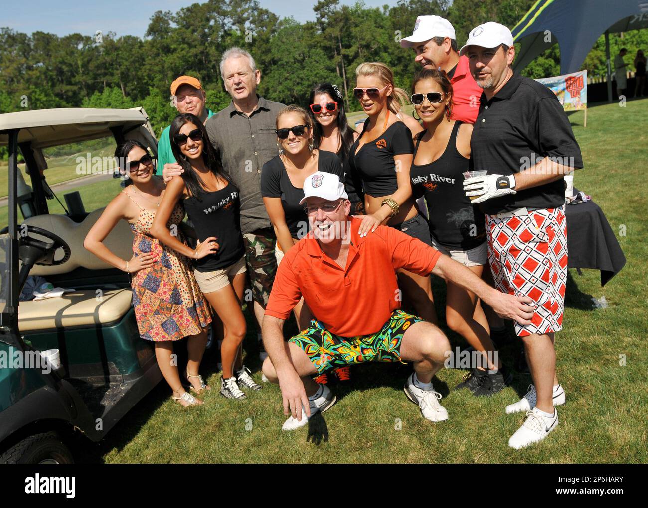 Actor Bill Murray, fourth from left, poses for a photo with the women
