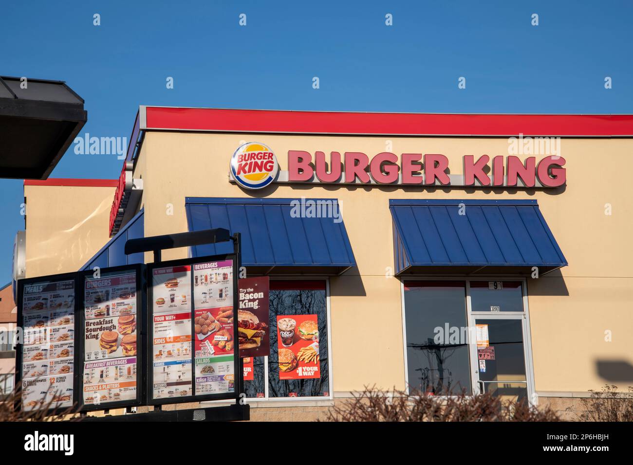 Lansing, Kansas. Exterior of Burger King fast food restaurant showing drive thru menu. Stock Photo