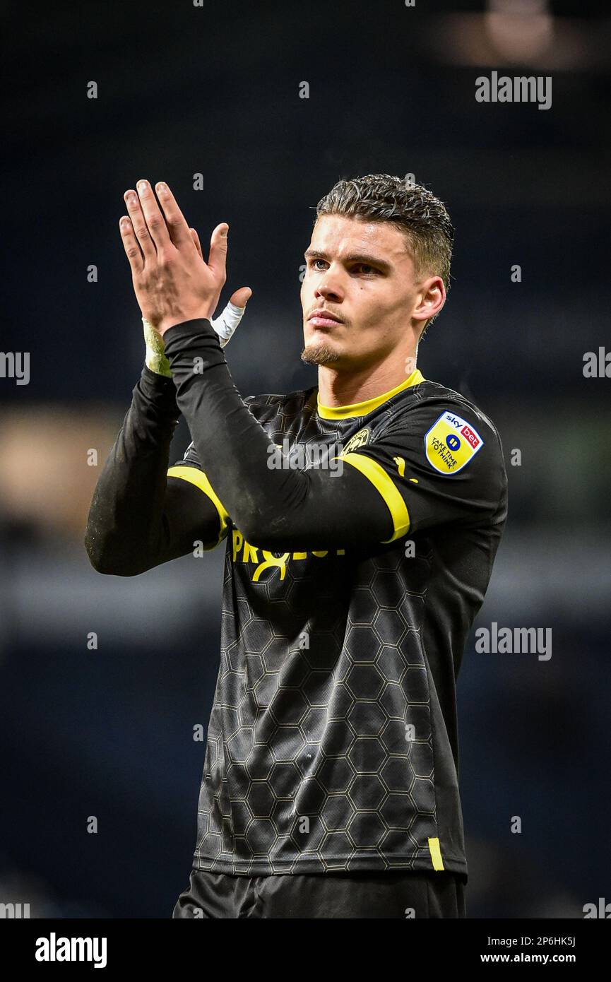 7th March 2023: The Hawthorns, West Bromwich, West Midlands, England; EFL Championship Football, West Bromwich Albion versus Wigan Athletic; Omar Rekik of Wigan Athletic applauds his team's travelling fans after the final whistle Stock Photo
