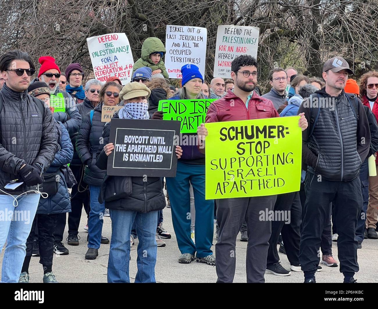 Jews and others rally & march in Brooklyn near Senator  Chuck Schumer's home demanding the US cut military funding to Israel in light of attacks and killing Palestinian civilians and destroying homes and Palestinian property in the West Bank and elsewhere. Stock Photo
