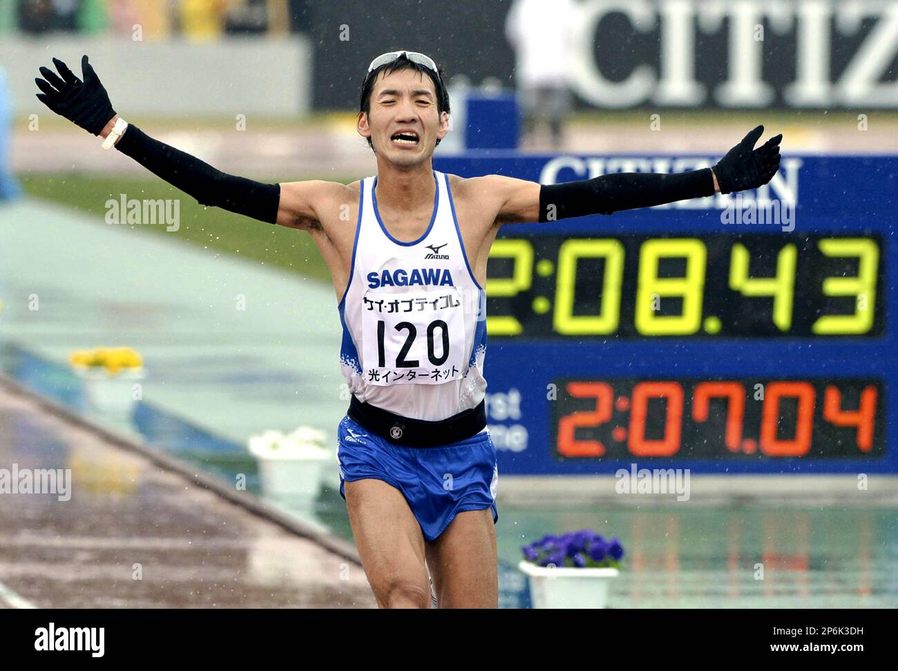 Ryo Yamamoto of Japan crosses the finish line in the Lake Biwa
