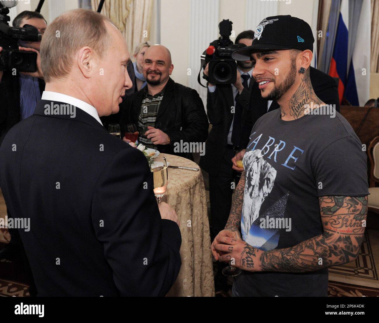 Russian Prime Minister Vladimir Putin, Left, Speaks With Russian.