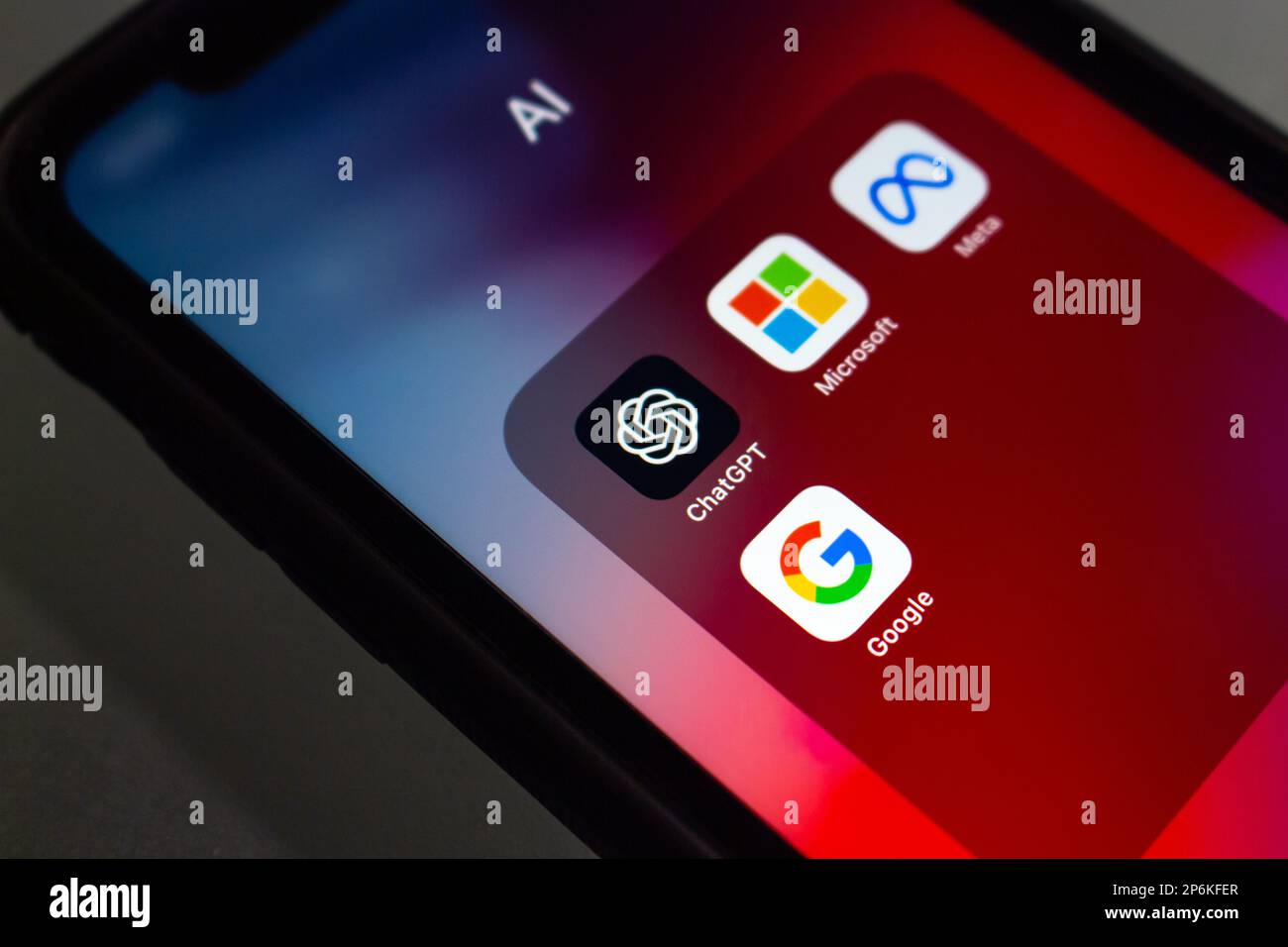 ChatGPT, an AI chatbot by OpenAI, with Microsoft, Meta Platforms and Google icons seen in an iPhone. Generative AI technology and Big Tech concept Stock Photo
