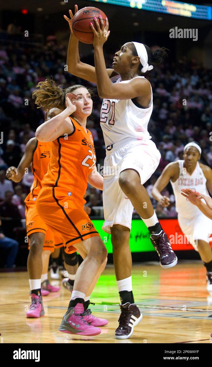 Texas A&M's Adaora Elonu, right, shoots past Oklahoma State's Lindsey