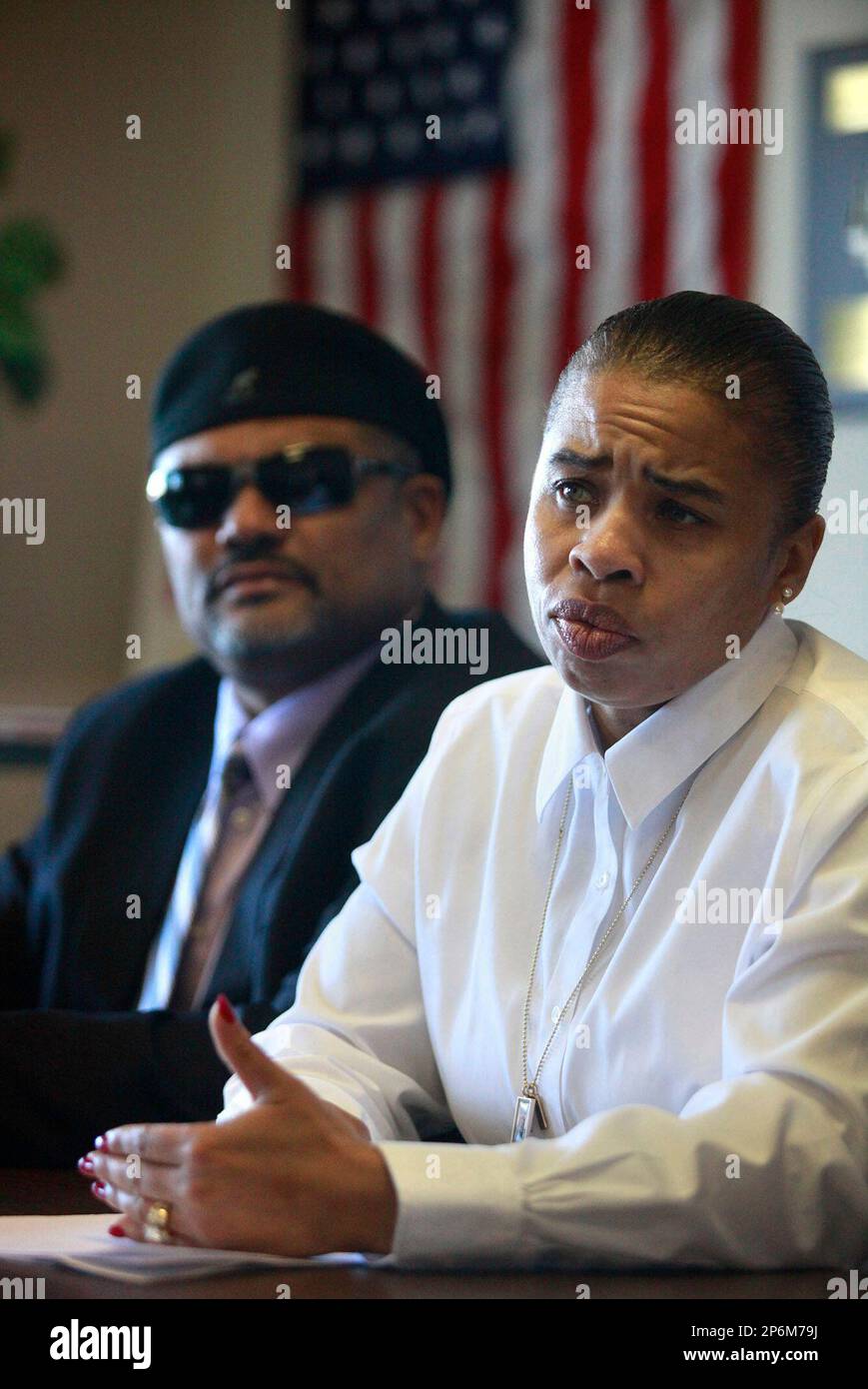 Odessa Doucet speaks beside her husband Reginal Doucet Sr. during a press  conference regarding the killing of their son Reggie Doucet Jr. at the  Monterey County NAACP office in Seaside, Calif. on