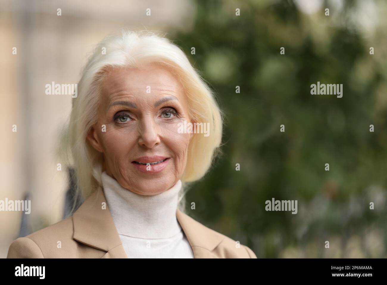 Mature woman outdoors hi-res stock photography and images - Alamy