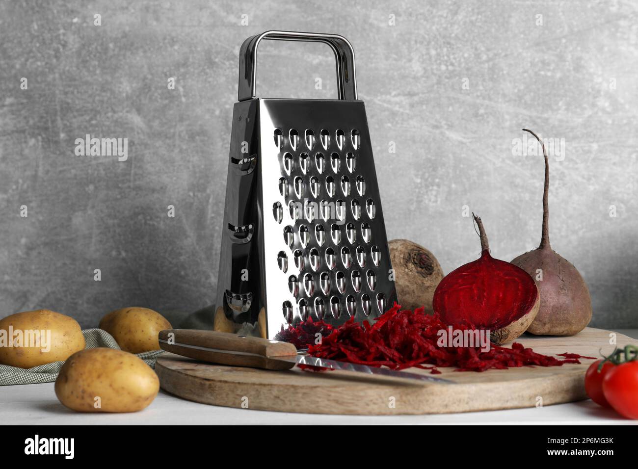Stainless steel vegetable grater Stock Photo by ©digitalr 5374130