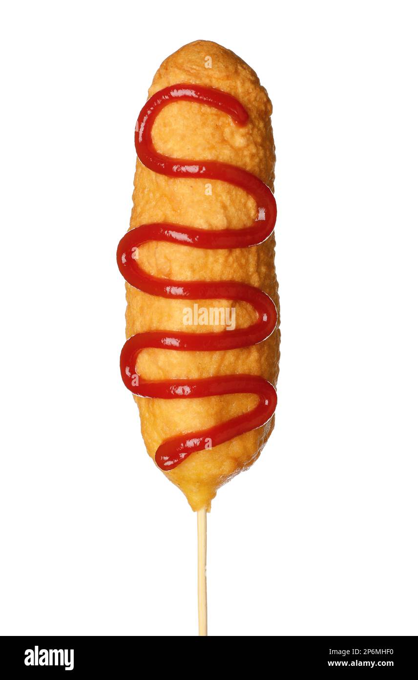 Delicious deep fried corn dog with ketchup isolated on white Stock