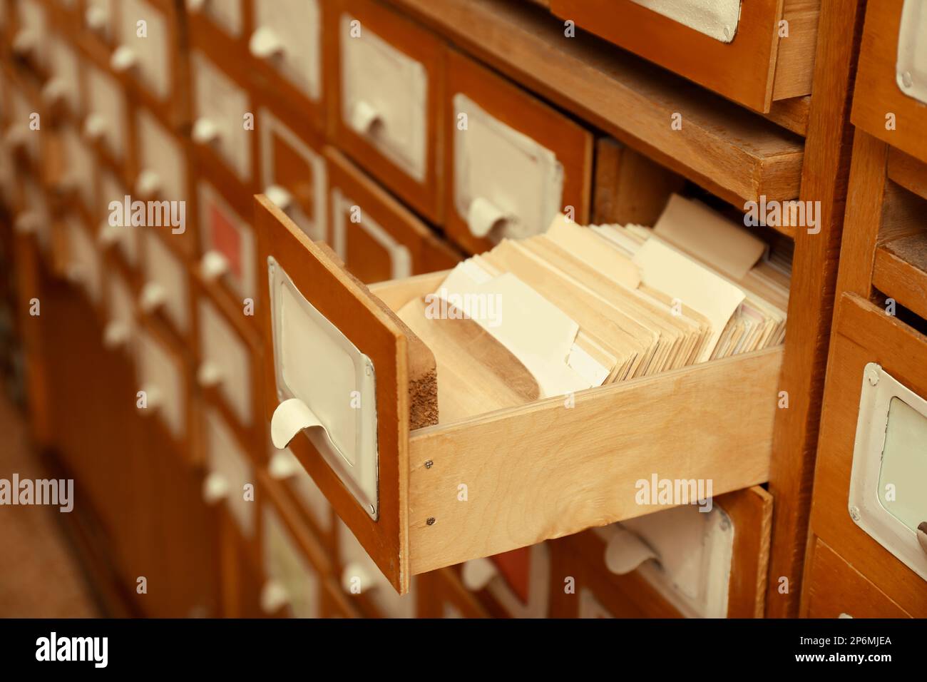 Closeup view of library card catalog drawers Stock Photo Alamy