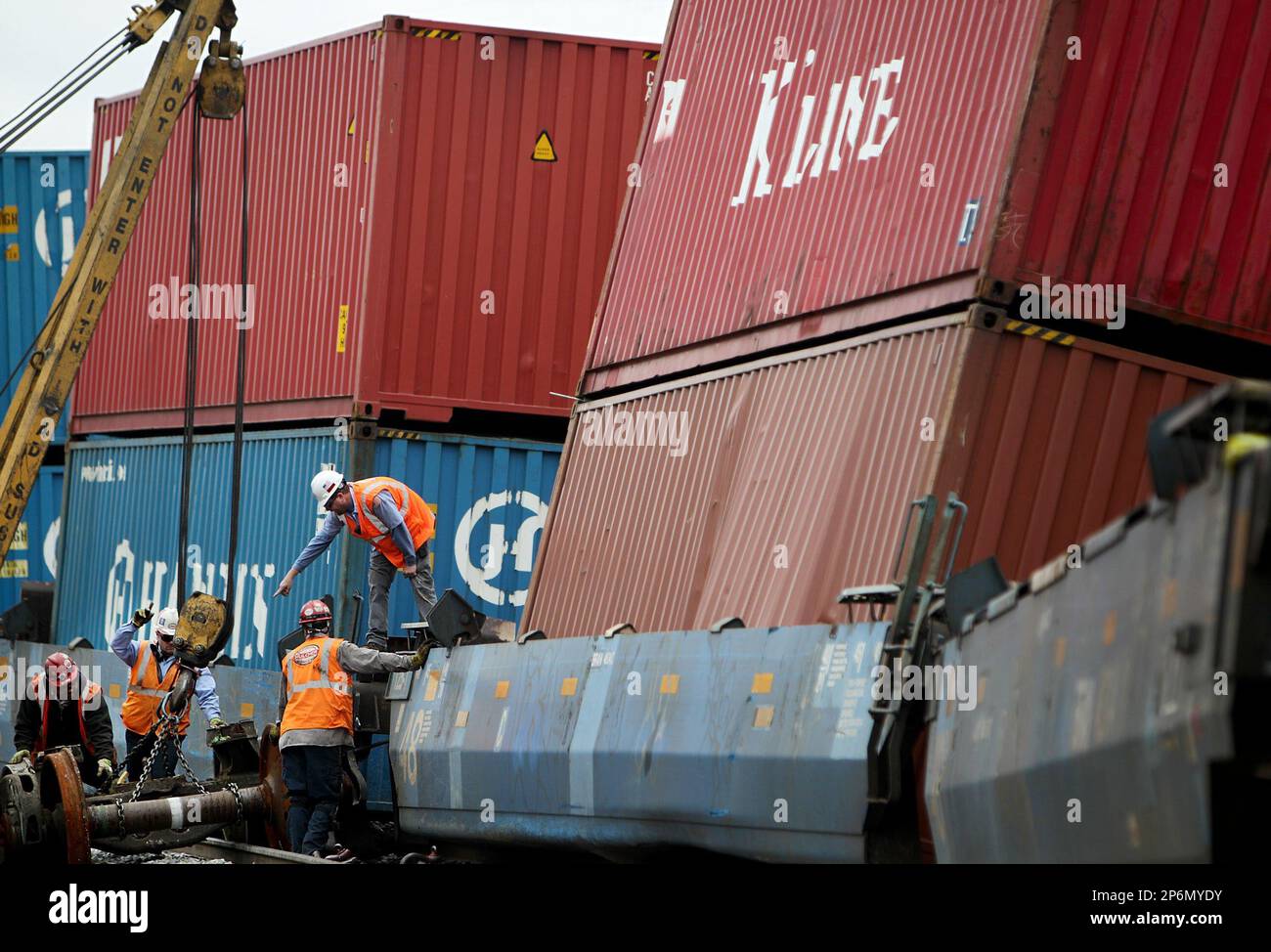 In a Sunday Feb 5 2012 photo - In A Sunday Feb 5 2012 Photo Emergency Crews Work To Get A Train Back On Track On The Norfolk Southern Rail Line After It Derailed Along Poplar Ave In Memphis Tenn Monday The Cause Of The Derailment Was Still Under Investigation No One Was Injured Ap Photo The Commercial Appeal Mike Brown 2P6MYDY