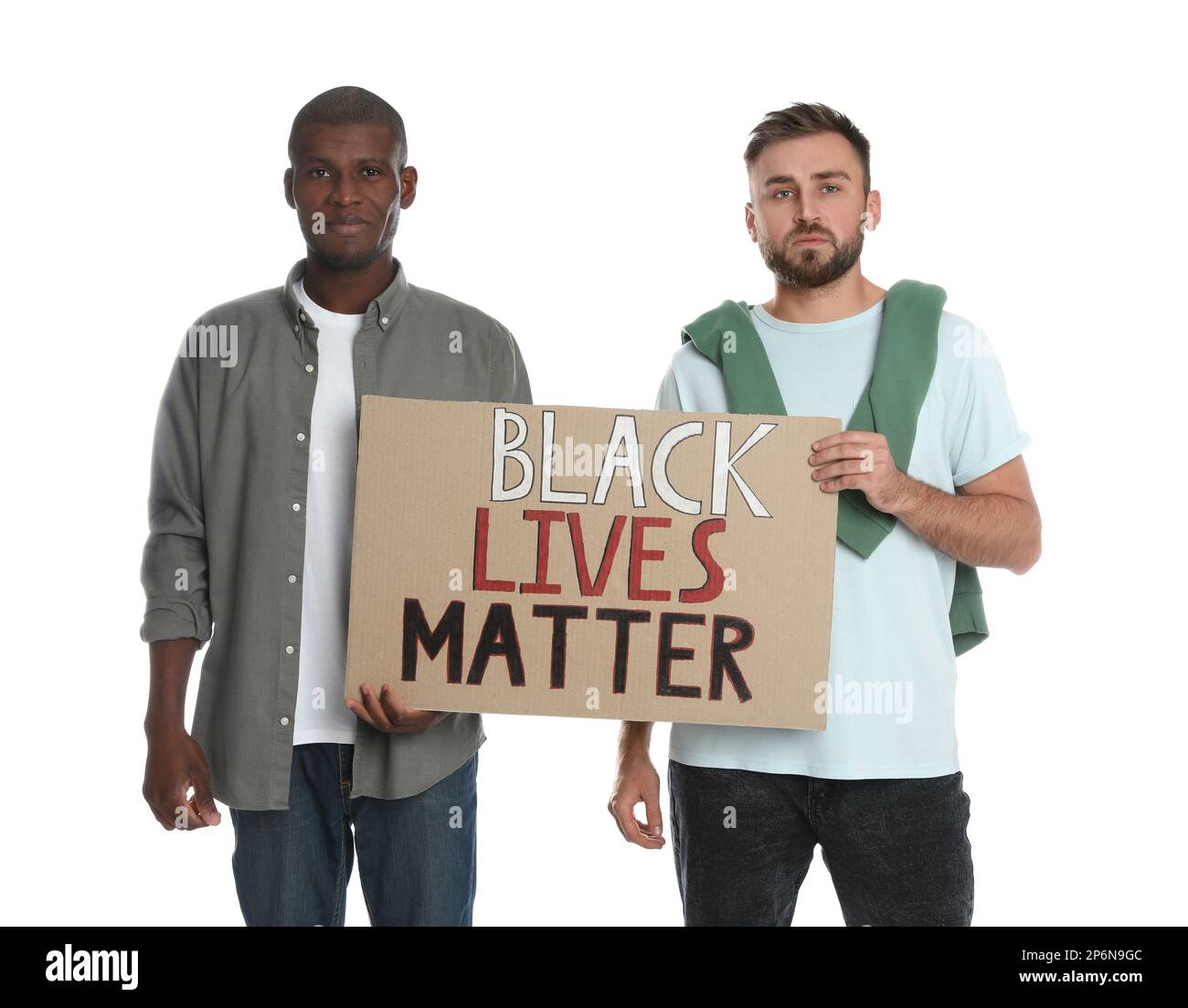 Men holding sign with phrase Black Lives Matter on white background. Racism concept Stock Photo