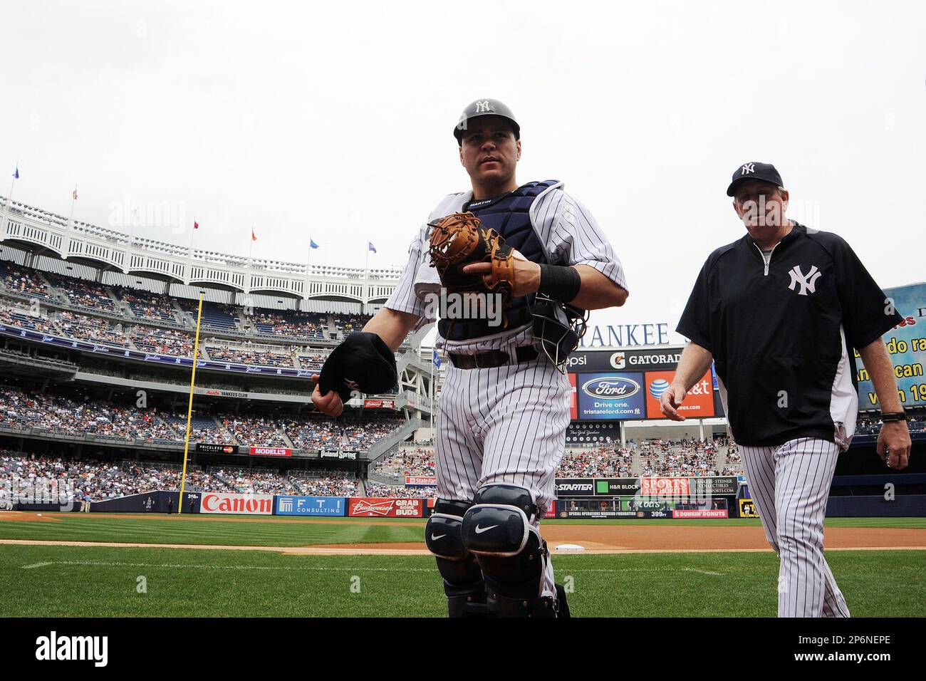 New York Yankees catcher Russell Martin (55) returns to the plate