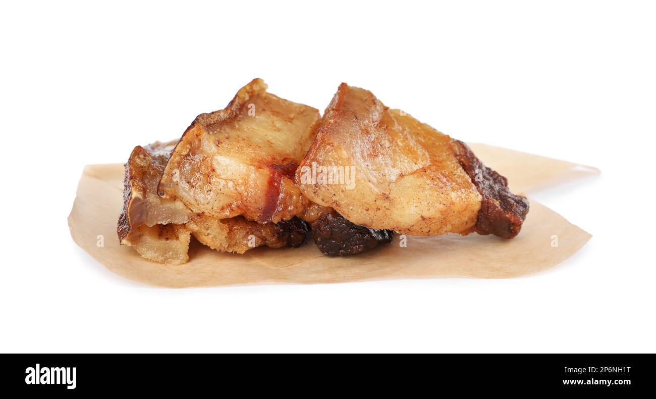 Tasty fried cracklings on white background. Cooked pork lard Stock