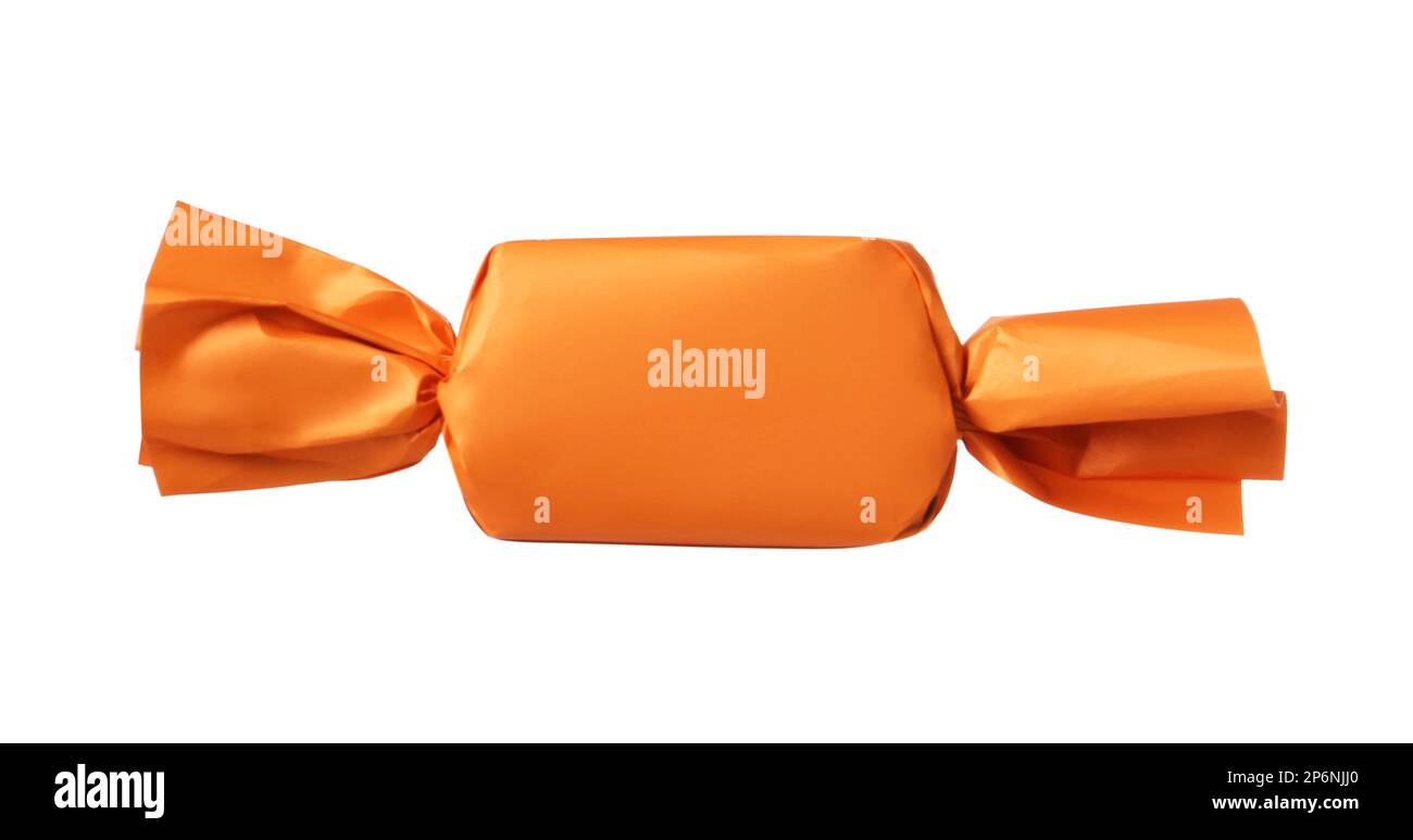 Delicious candy in orange wrapper isolated on white Stock Photo Alamy