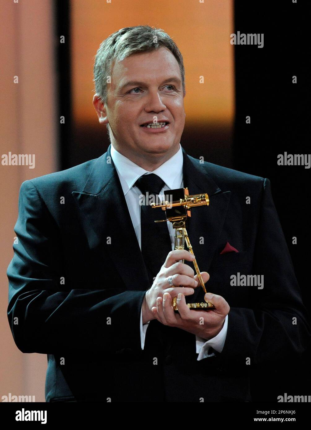German comedian Hape Kerkeling holds the trophy as best comedian during 