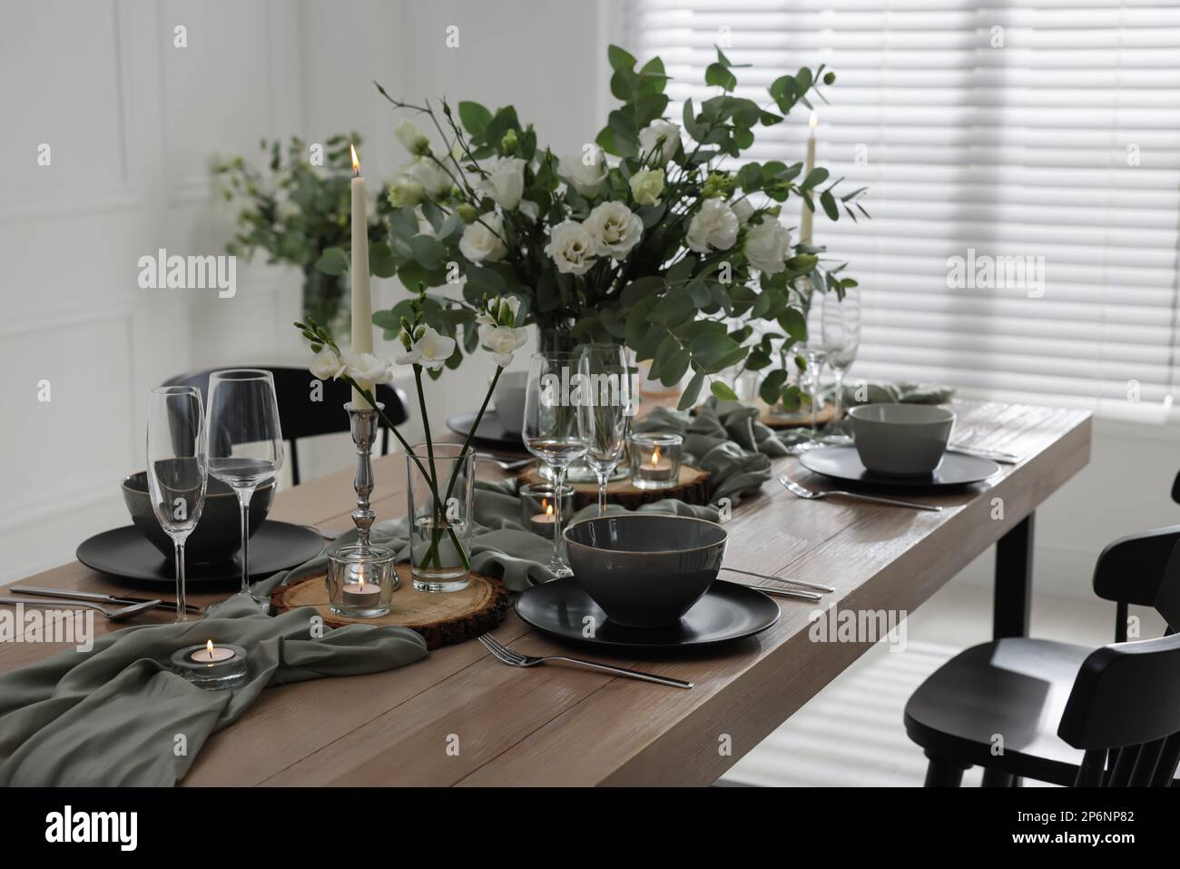Festive table setting with beautiful tableware and decor indoors Stock ...