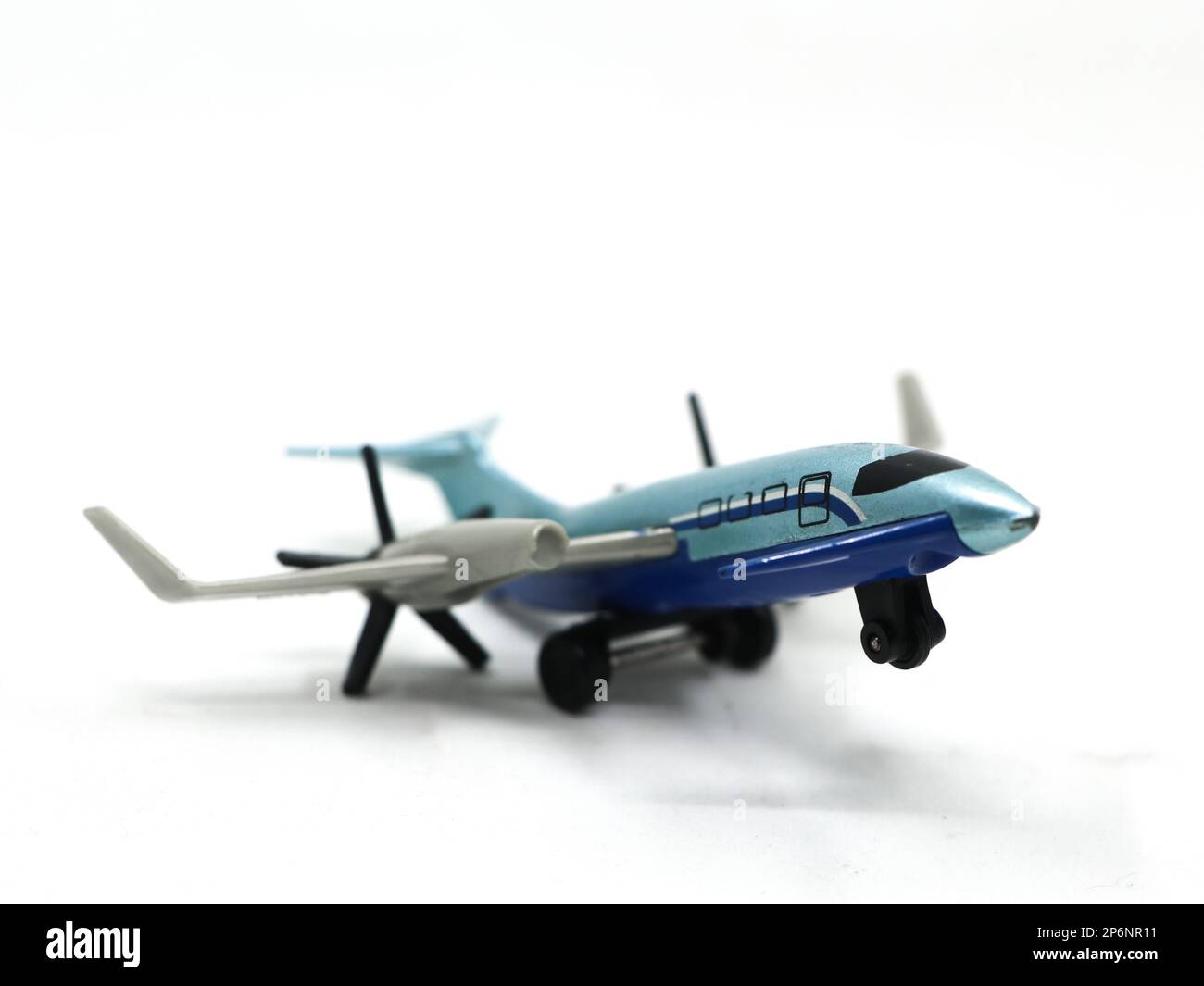 a blue airplane jet toy isolated in a white background Stock Photo