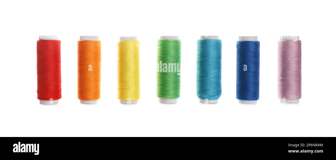 Set of colorful sewing threads on white background Stock Photo - Alamy