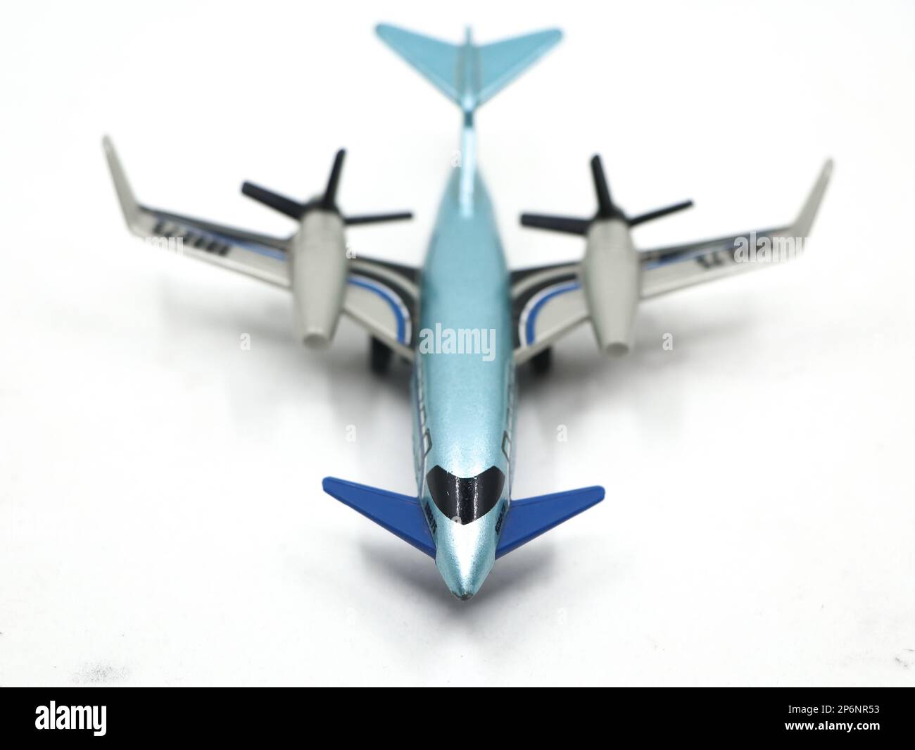 a blue airplane jet toy isolated in a white background Stock Photo - Alamy