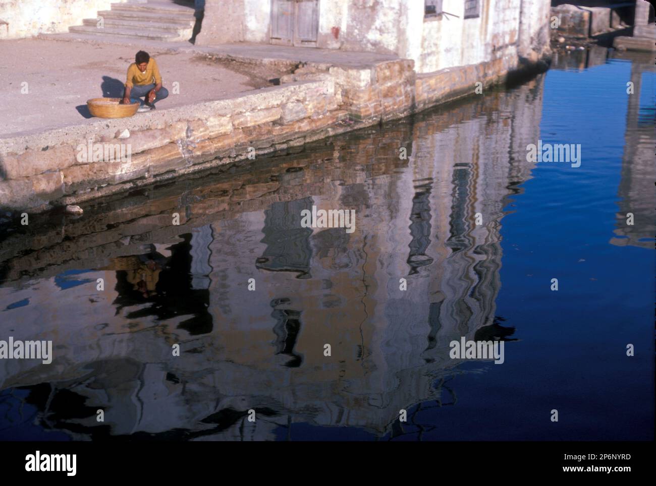 Reflections on Arwad Island, 20 ha lying off the city of Tartus in Western Syria.. Stock Photo