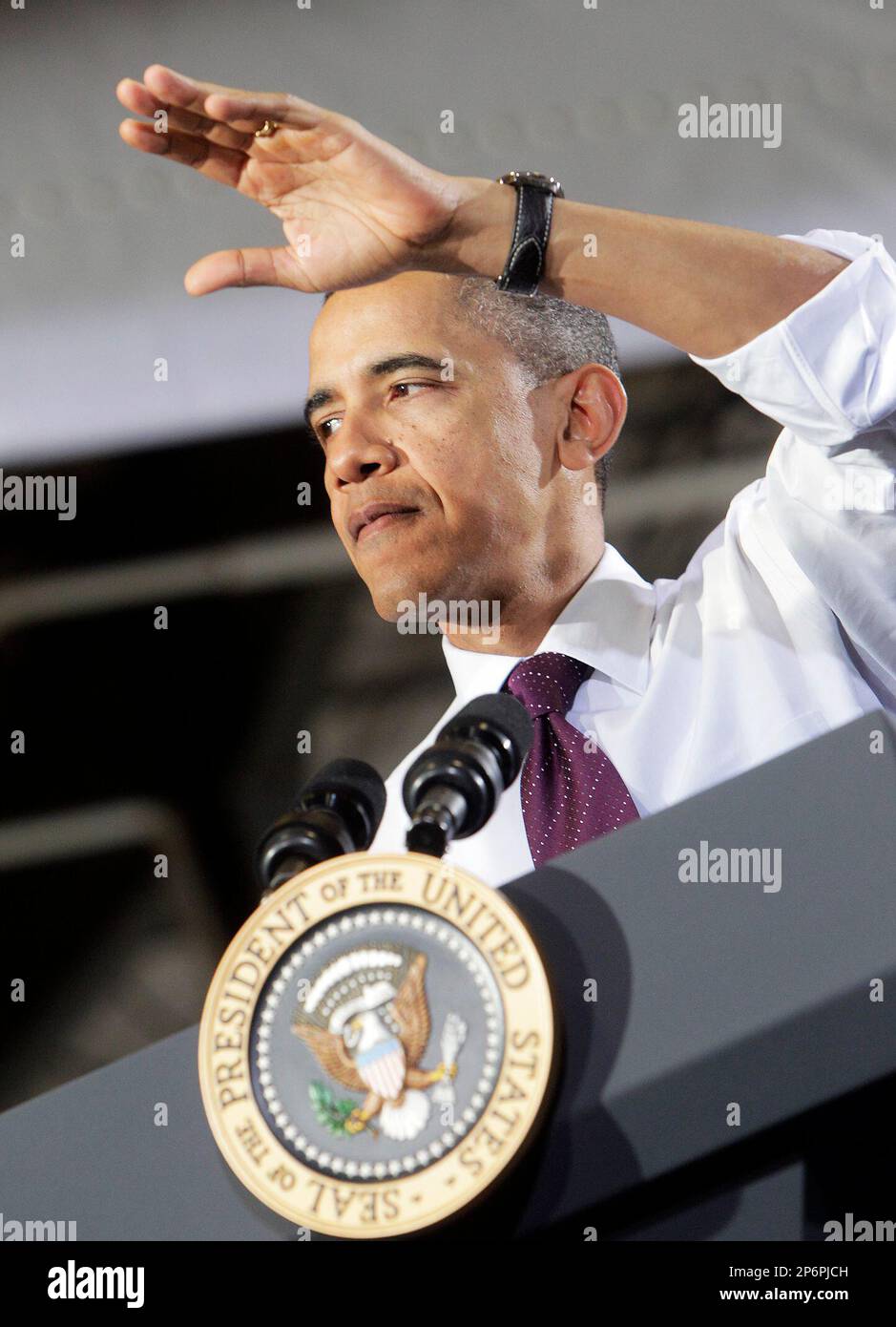 President Barack Obama waves to the audience before speaking at