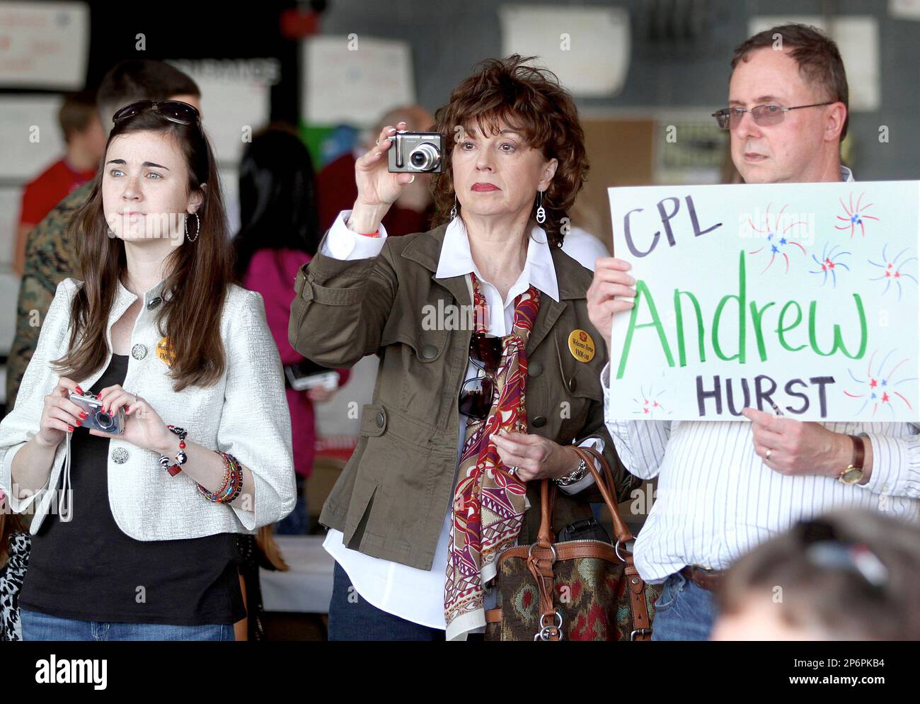 From left, sister Julie Hurst, mother Tierney Hurst and father Terry