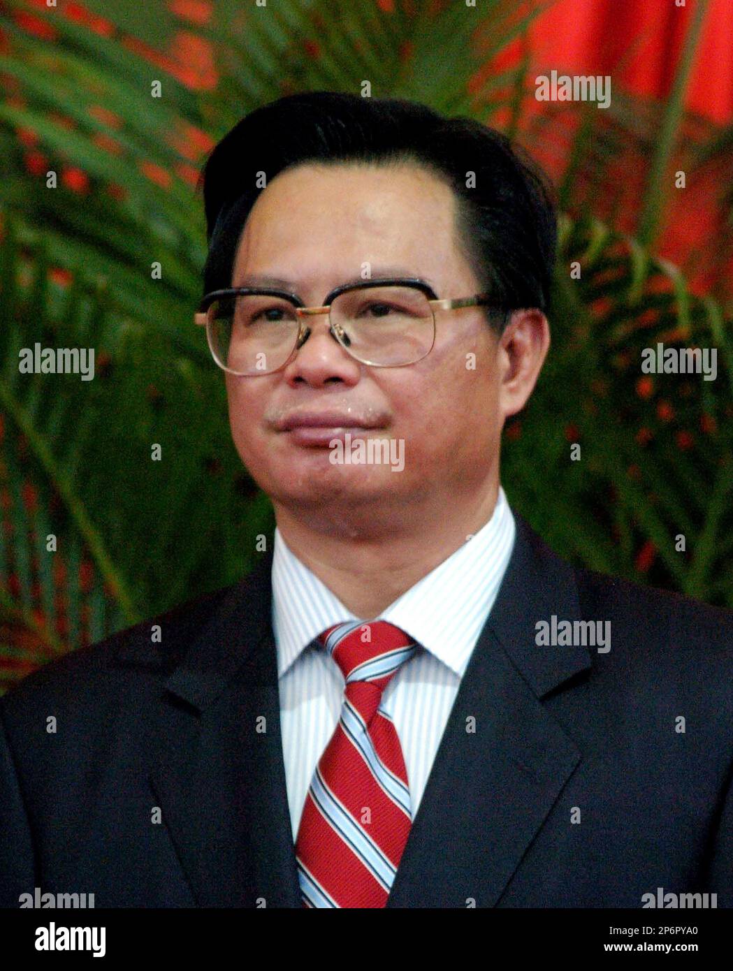 Guangdong united front work department head Zhou Zhenhong is seen in ...