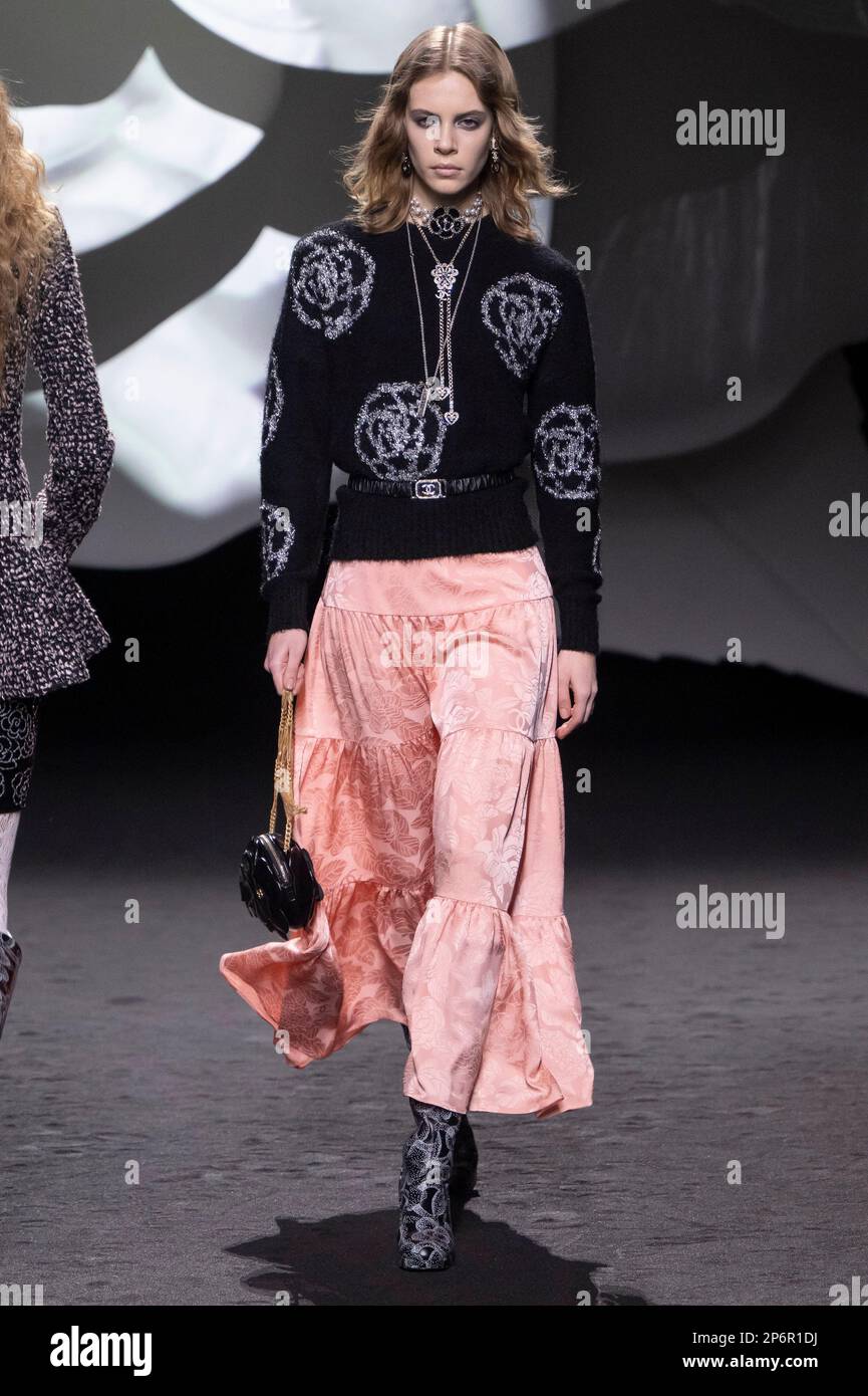Paris France, 07/03/2023, A model walks on the runway at the Chanel fashion  show during the Fall Winter 2023 Collections Fashion Show at Paris Fashion  Week in Paris on March 7 2023. (