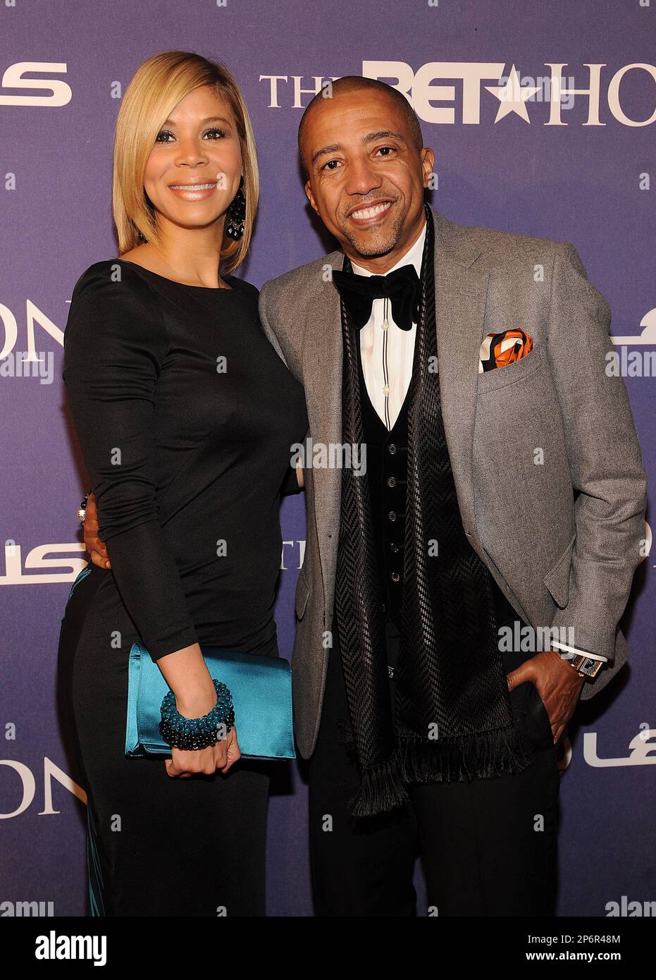 WASHINGTON, DC - JANUARY 14: Kevin Liles and wife Erika Liles arrive at the  BET Honors 2012 at the Warner Theatre, January 14, 2012 in Washington, DC.  The BET Honors 2012 will