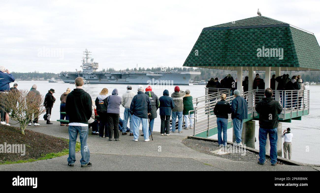 The USS Ronald Reagan arrives at Bremerton, Wash., Tuesday, Jan. 10, 2012. The aircraft carrier
