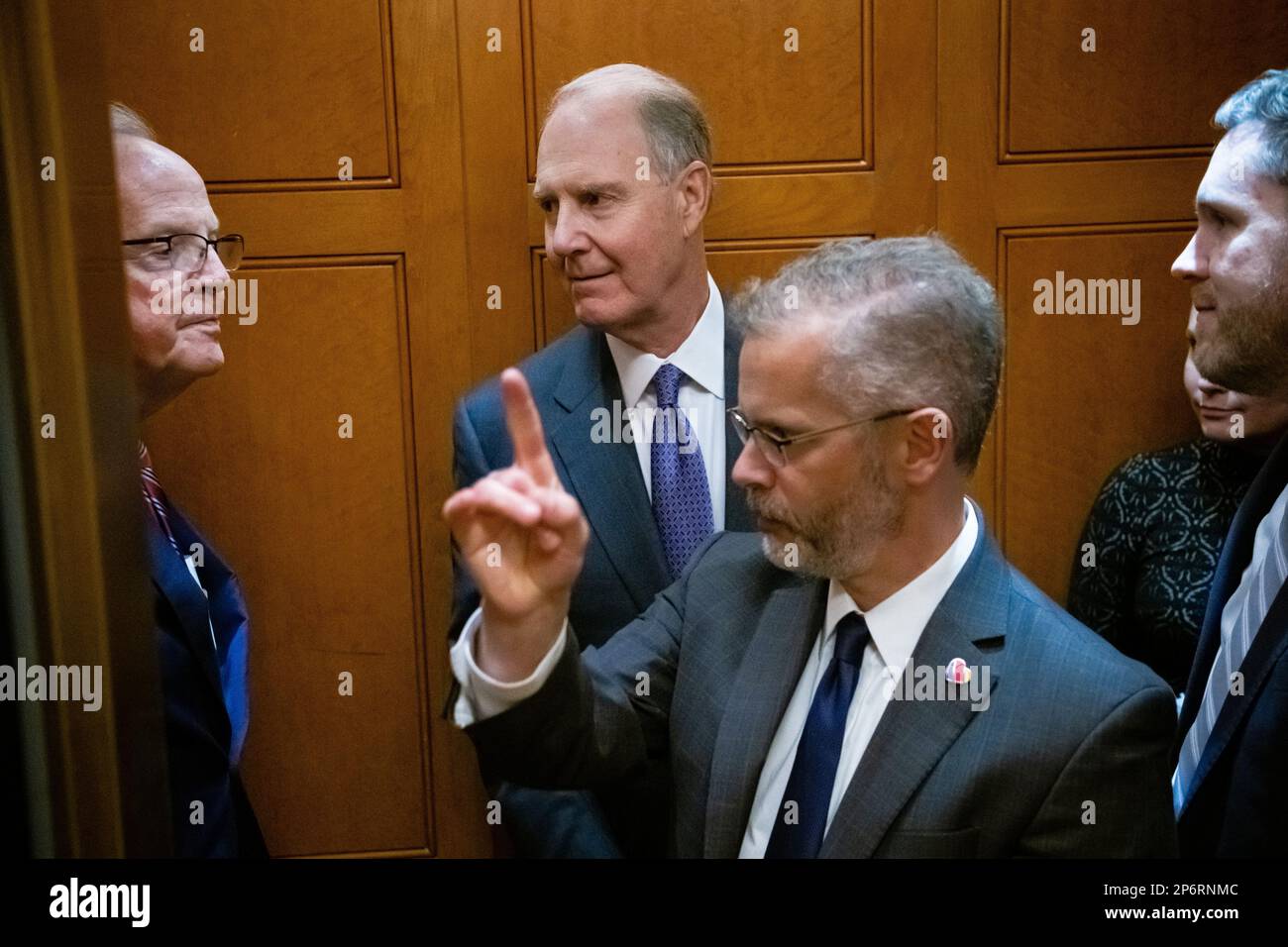 Washington, USA. 07th Mar, 2023. Gary Kelly, center, chief executive officer of Southwest Airlines, rides an elevator with Senator Jerry Moran (R-KS), left, and others at the U.S. Capitol, in Washington, DC, on Tuesday, March 7, 2023. (Graeme Sloan/Sipa USA) Credit: Sipa USA/Alamy Live News Stock Photo