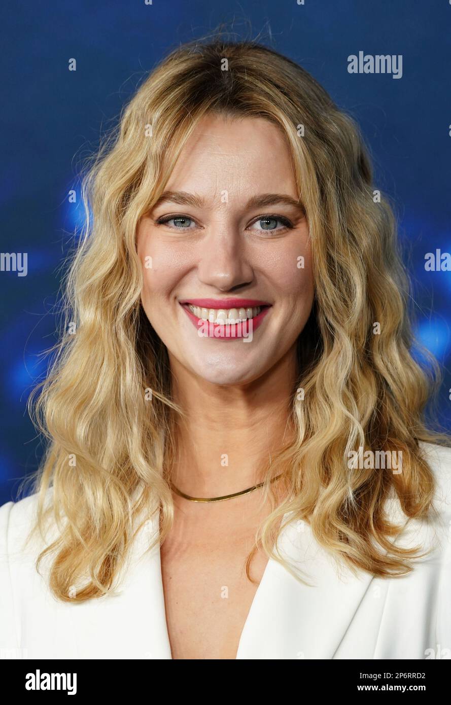 Yael Grobglas arrives at the season three premiere of "Ted Lasso" on