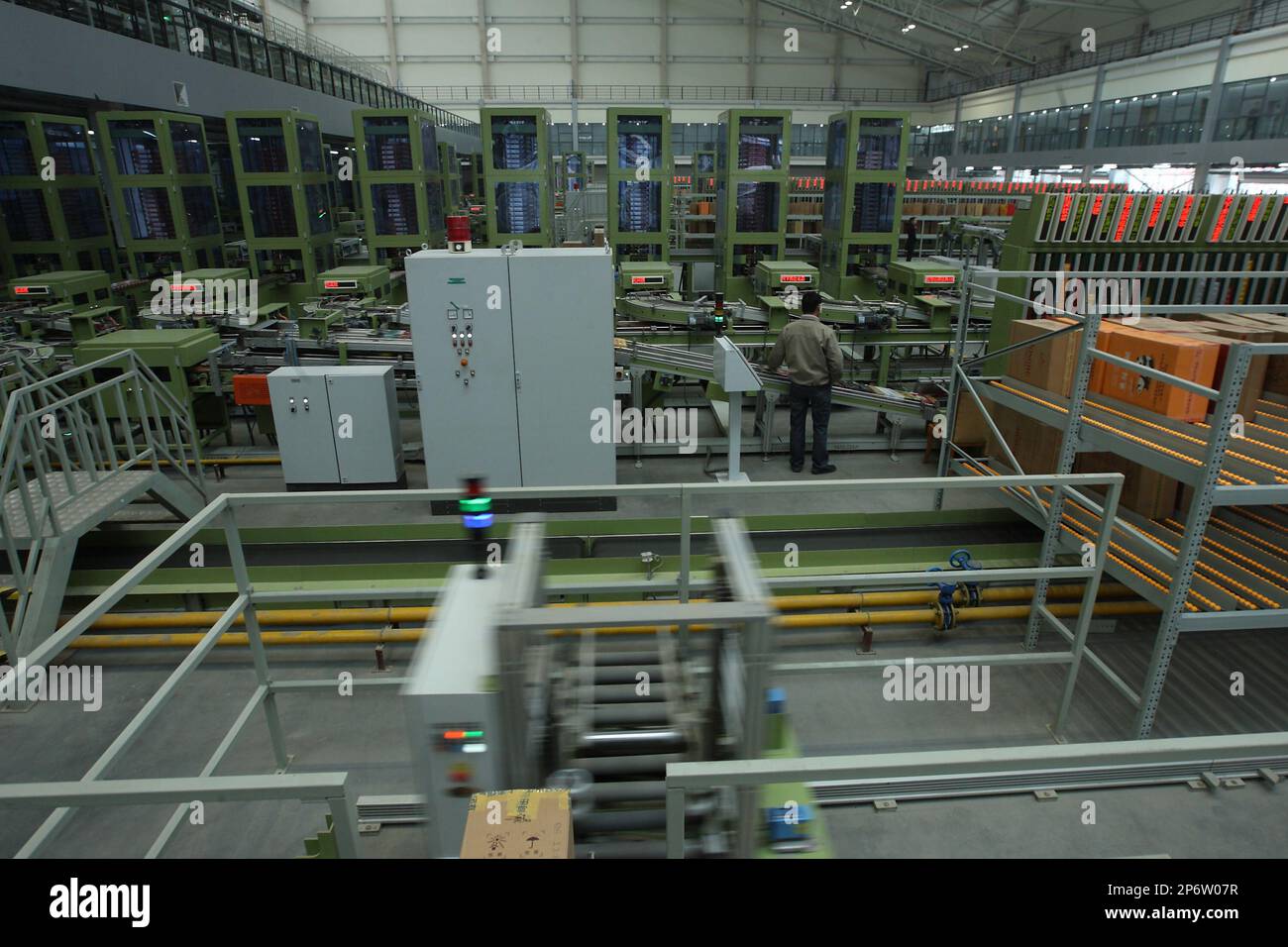 tobacco logistics Employees work at the Chengdu Tobacco Logistics Center in Chengdu in  southwest China's Sichuan province on Thursday, Dec. 15, 2011. The center  with an investment of 260 million yuan covers an area