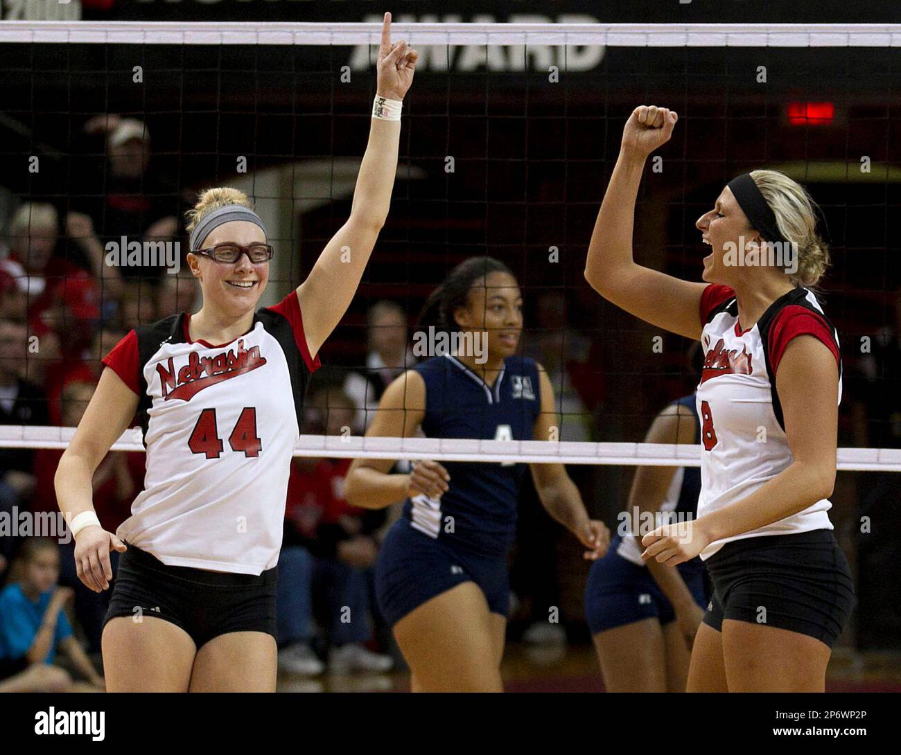 Nebraskas Hannah Werth (44) and Brooke Delano (8) celebrate a kill in the third set as Nebraska beat Jackson State 3-0 in the opening round of the NCAA college volleyball tournament Thursday,