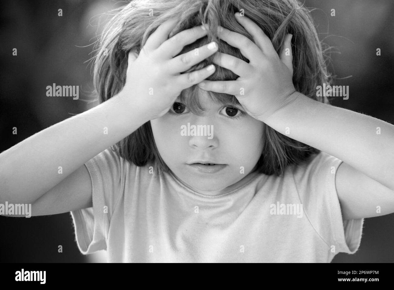 Kids emotions. Confused boy. Negative, nervous breakdown Stock Photo