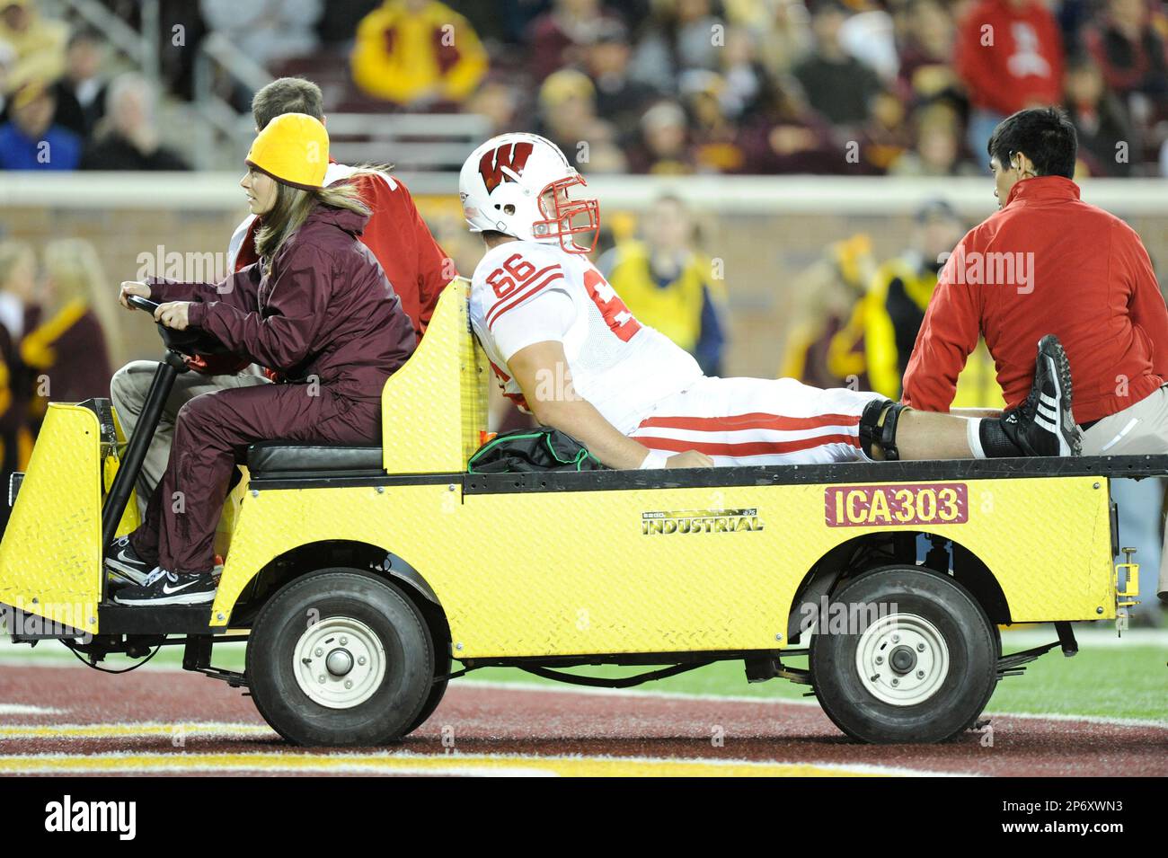 2011 NOV 12: Wisconsin's Peter Konz (66) is carted off the field during ...